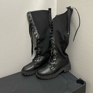 Black knee high lace up boot. Size 6